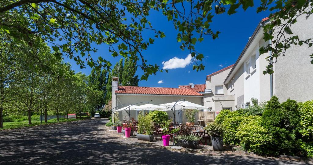 Logis Hotel Le Moulin Des Gardelles รีอง ภายนอก รูปภาพ