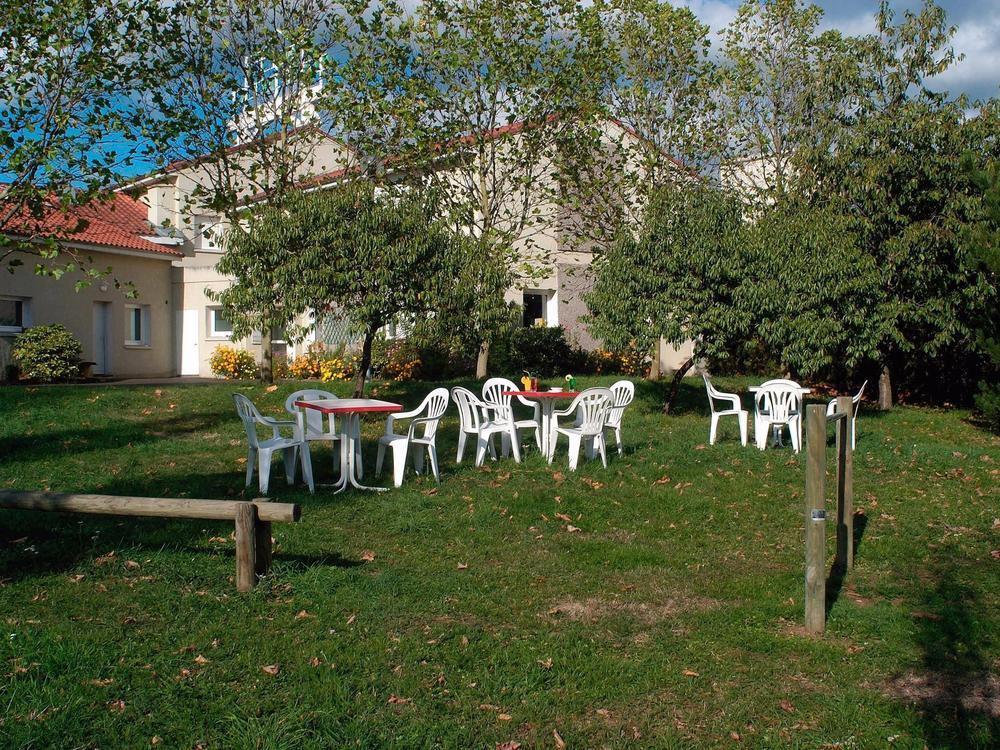 Logis Hotel Le Moulin Des Gardelles รีอง ภายนอก รูปภาพ